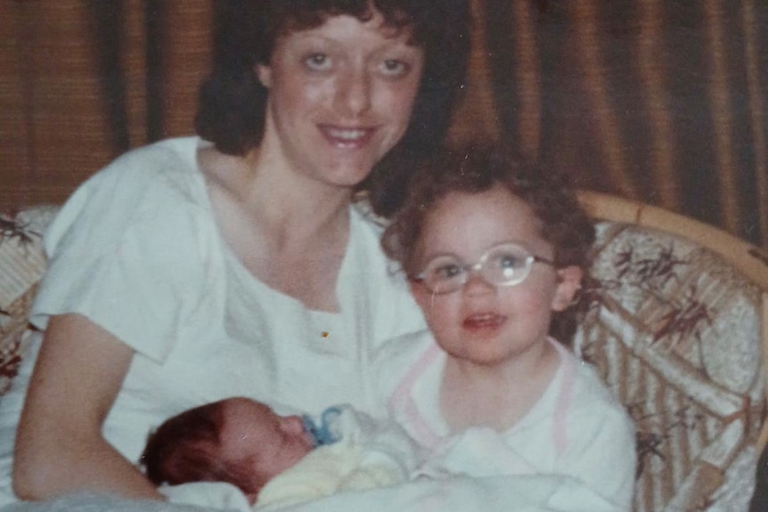 kelly with two young children